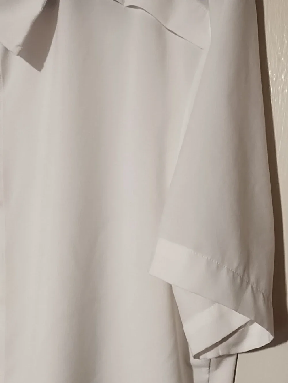 adidas EUC Medium AeroReady White Short-Sleeve Button Shirt with Black Logo.
